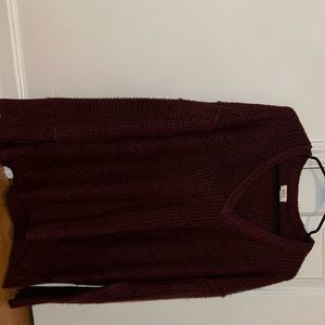 V-neck sweater. Comes with tag on it.